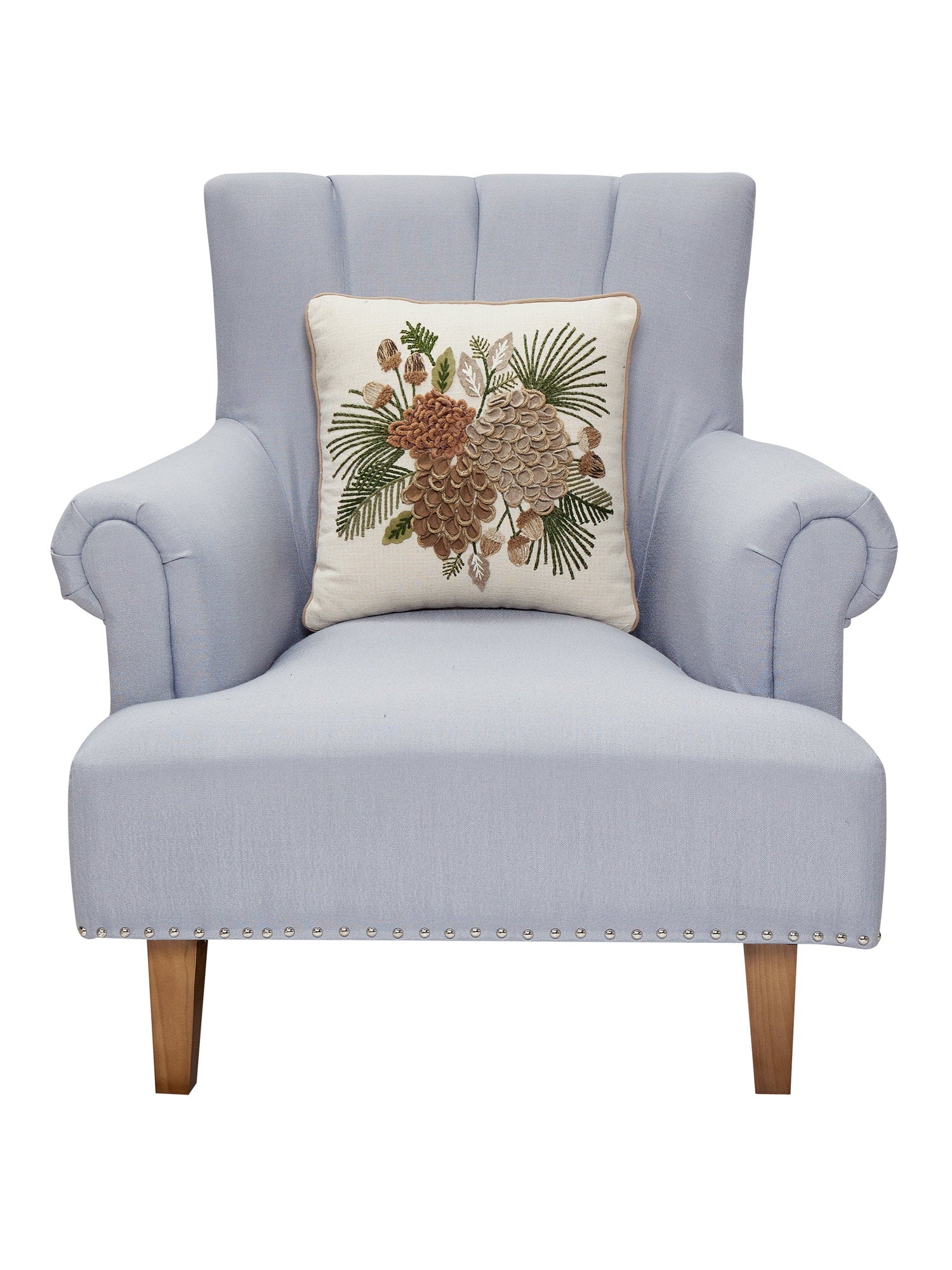 Pine Cluster Embroidered Christmas Throw Pillow on an armchair, showing the throw pillow at room scale, 16x16 inch