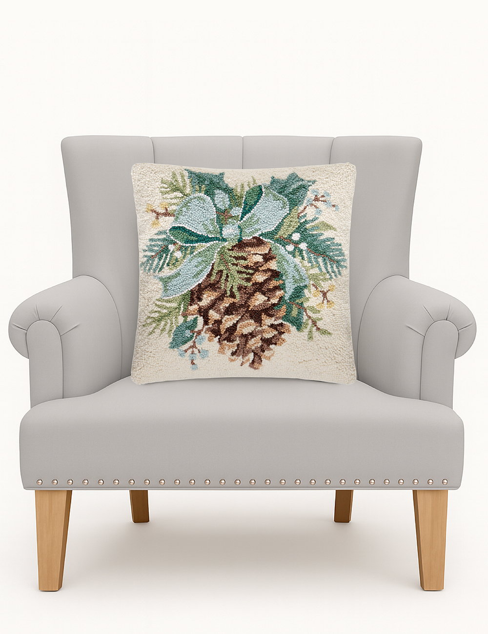 Pine Hooked Wool Christmas Throw Pillow on an armchair, showing the throw pillow at room scale, 16x16 inch