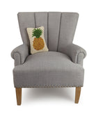 Pineapple Hooked Wool Throw Pillow on an armchair, showing the throw pillow at room scale, 8x12 inch