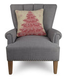 Pink Christmas Tree Hooked Wool Throw Pillow on an armchair, showing the throw pillow at room scale, 18x18 inch