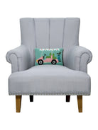 Pink Golf Cart Hooked Wool Christmas Throw Pillow on an armchair, showing the throw pillow at room scale, 8x12 inch