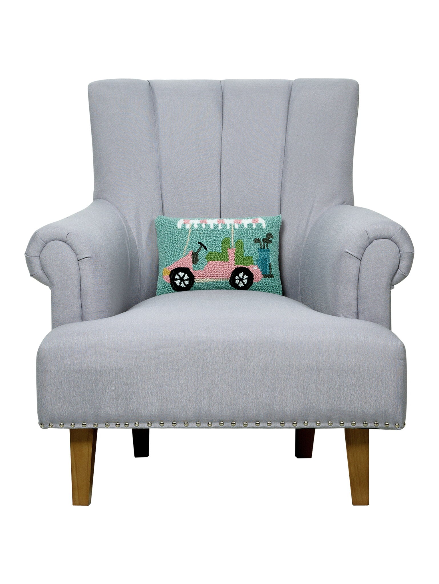 Pink Golf Cart Hooked Wool Christmas Throw Pillow on an armchair, showing the throw pillow at room scale, 8x12 inch