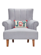 Pink Joy with Pompom Hooked Wool Christmas Throw Pillow on an armchair, showing the throw pillow at room scale, 8x12 inch