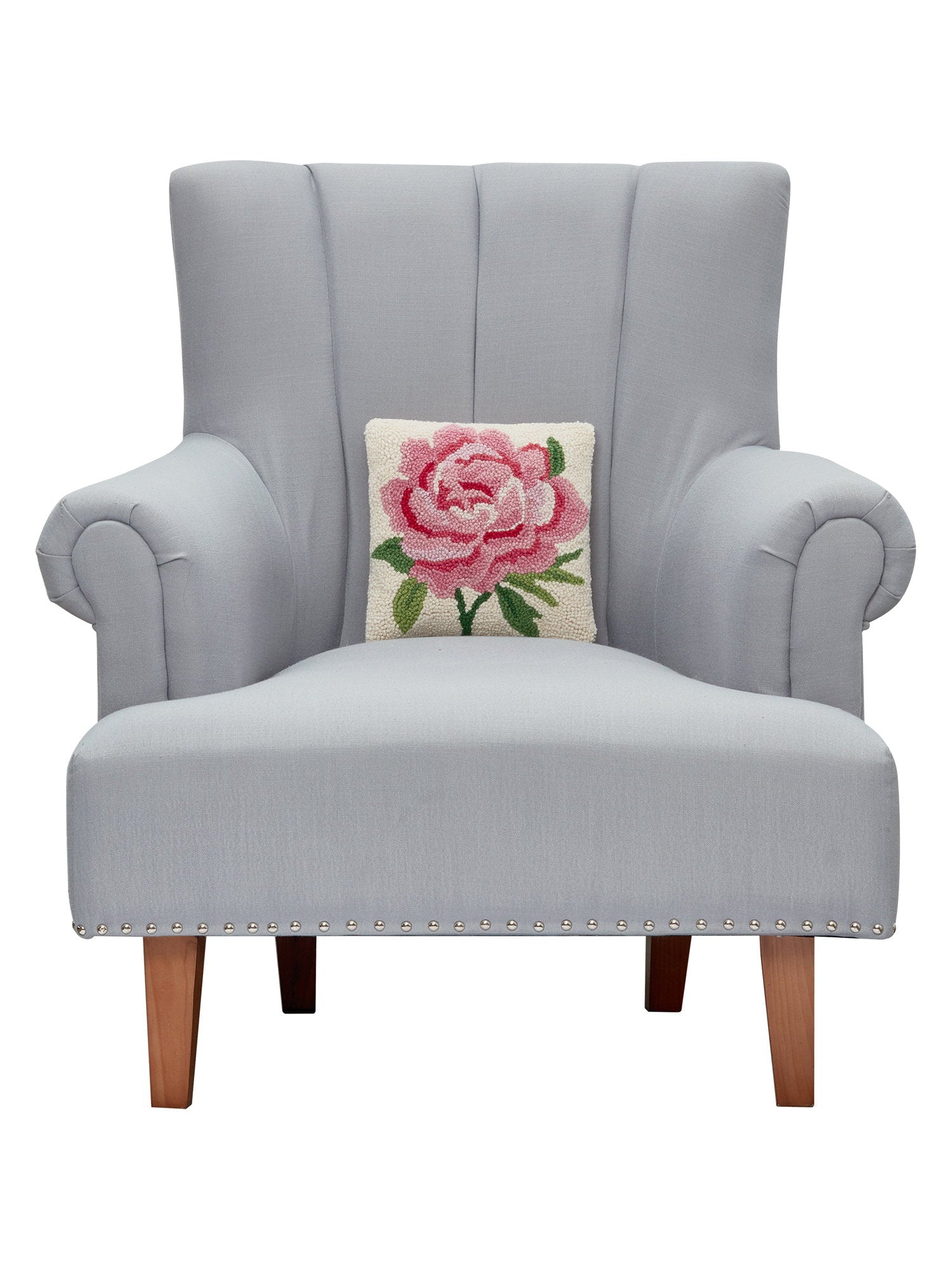 Pink Peony Hooked Wool Throw Pillow on an armchair, showing the throw pillow at room scale, 10x10 inch