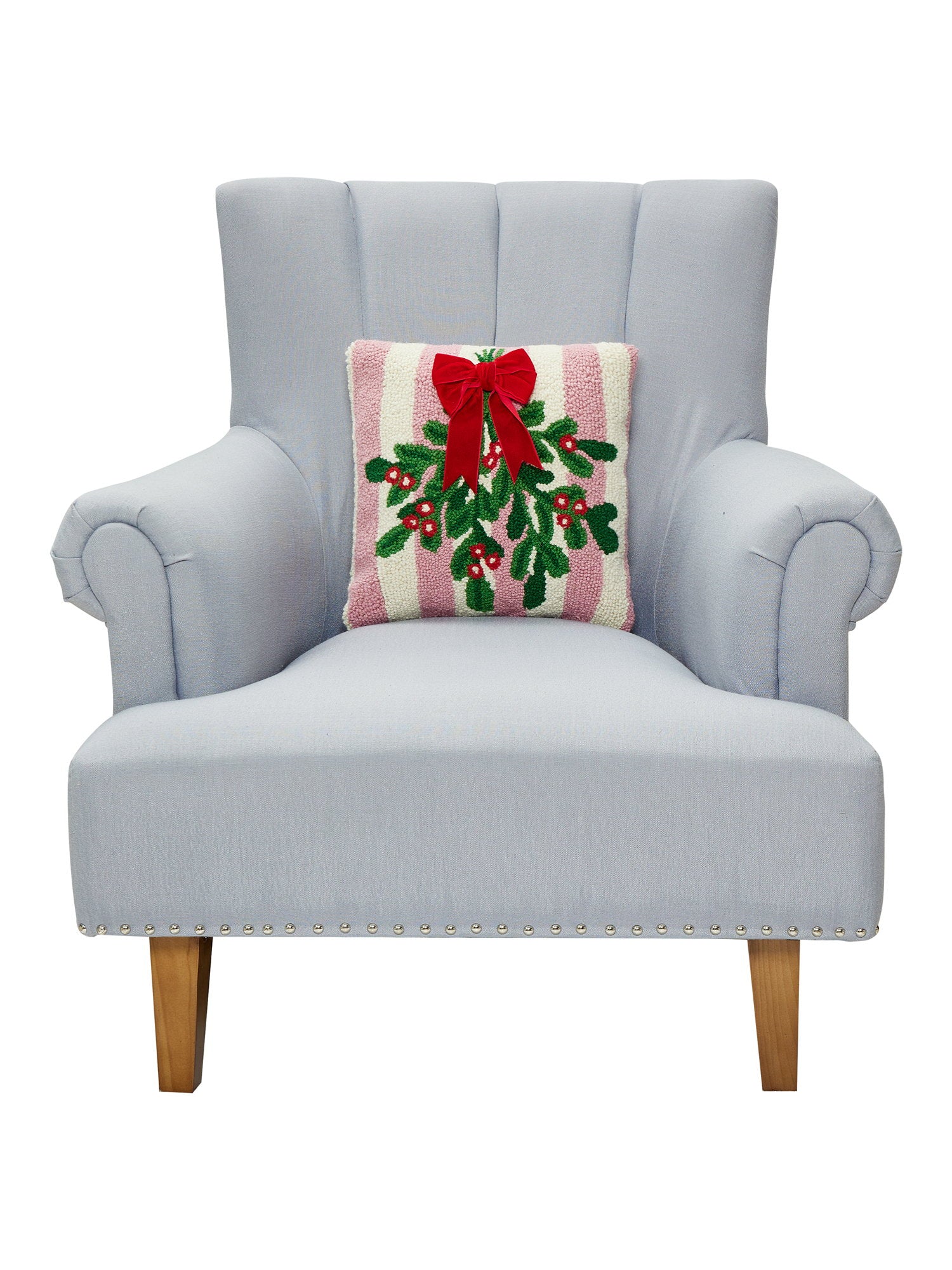 Pink Stripe Mistletoe with Ribbon Hooked Wool Christmas Throw Pillow on an armchair, showing the throw pillow at room scale, 14x14 inch
