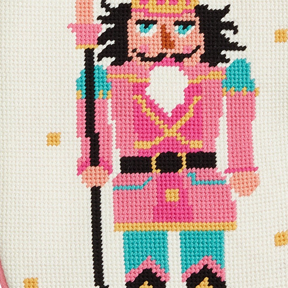 Closeup of Pink Turquoise Nutcracker Embroidered Needlepoint Christmas Stocking showing stitch texture and craftsmanship detail