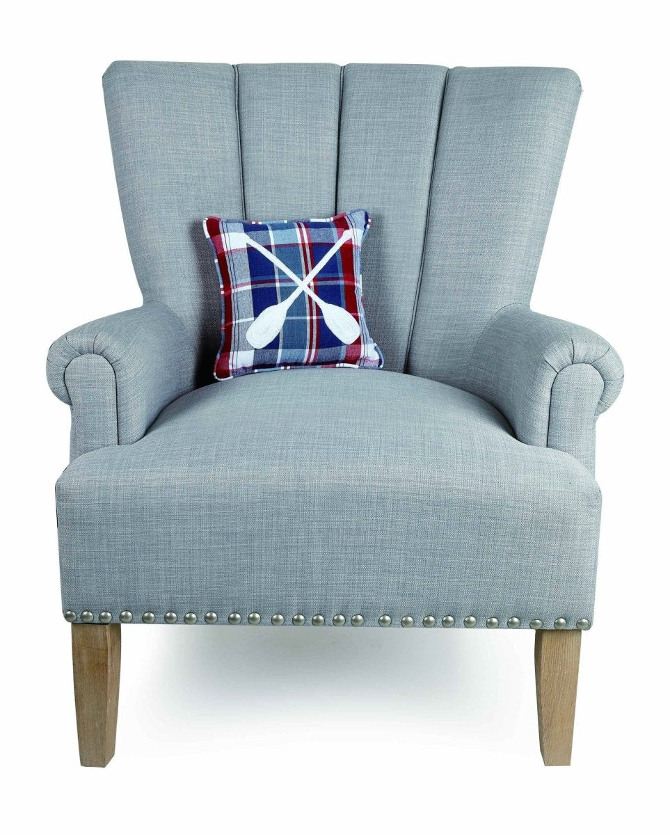 Plaid Oars Embroidered Throw Pillow on an armchair, showing the throw pillow at room scale, 10x10 inch