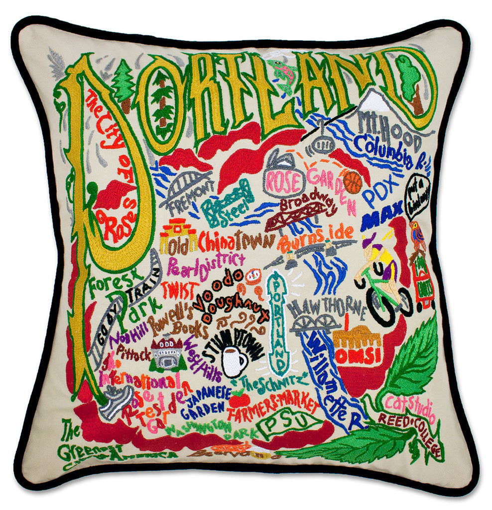 Portland, OR Rose City embroidered throw pillow with roses and cityscape.