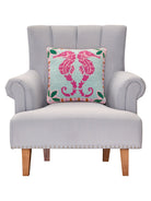 Preppy Seahorse Hooked Wool Throw Pillow on an armchair, showing the throw pillow at room scale, 16x16 inch
