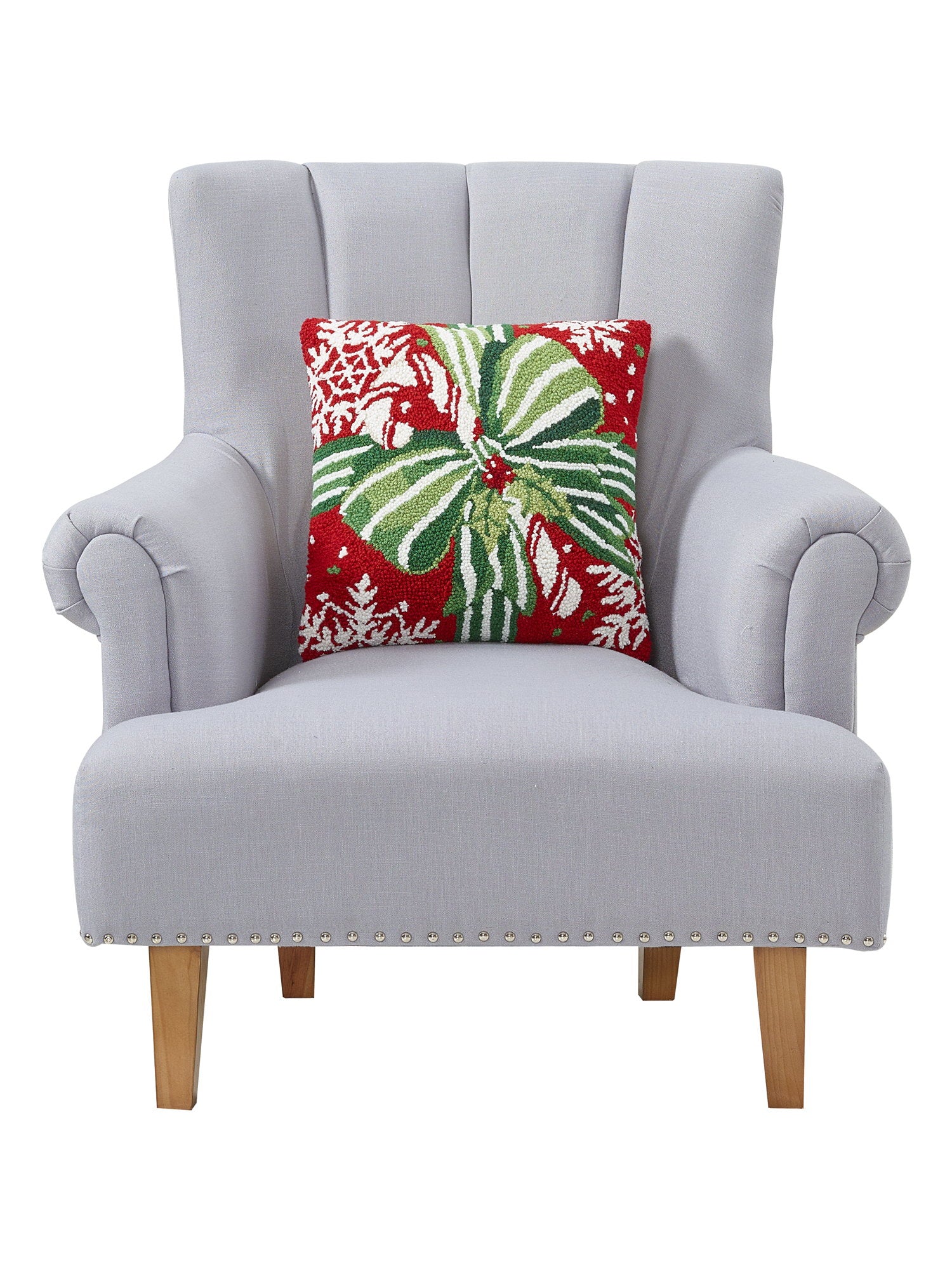 Pretty Present Hooked Wool Christmas Throw Pillow on an armchair, showing the throw pillow at room scale, 16x16 inch