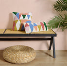Rainbow Triangles Hooked Wool Throw Pillow shown alongside other designs in the same collection, 8x20 inch