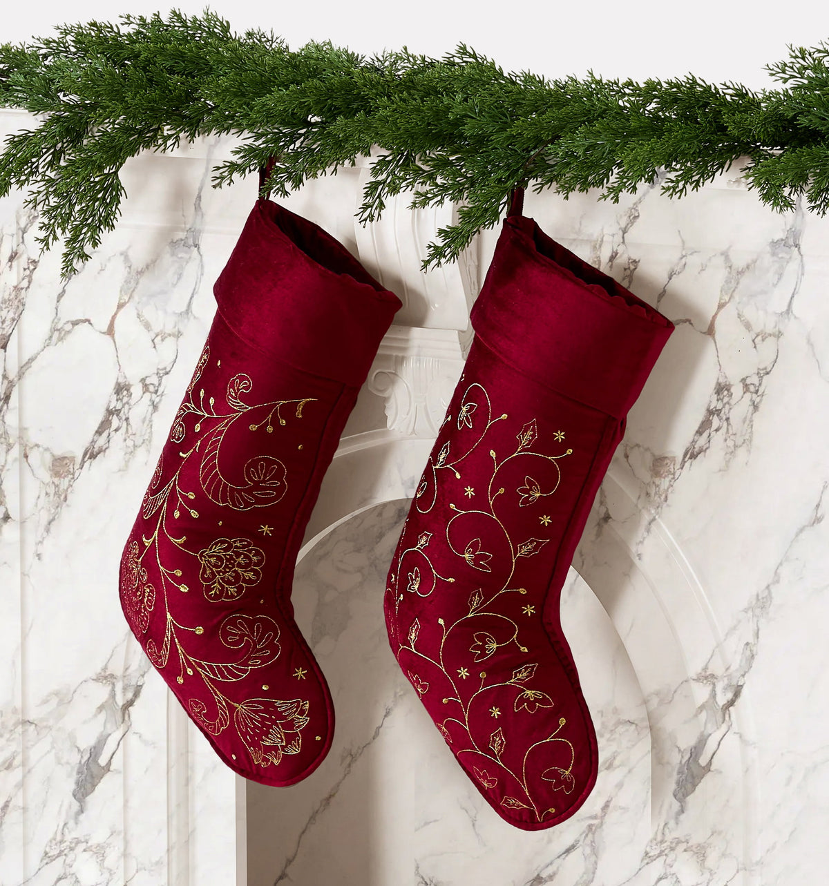 Red All Over Foliage Embroidered Christmas Stocking styled in a room setting, 12x20 inch