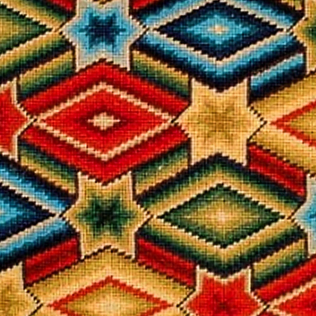 Closeup of Red Green Yellow Star needlepoint throw pillow highlighting hand-stitched wool craftsmanship and fabric detail