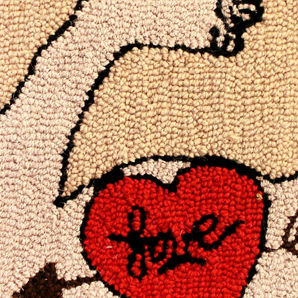 Red Heart Love Tattoo pillow fabric closeup showing hand-embroidered needlepoint wool texture and color detail