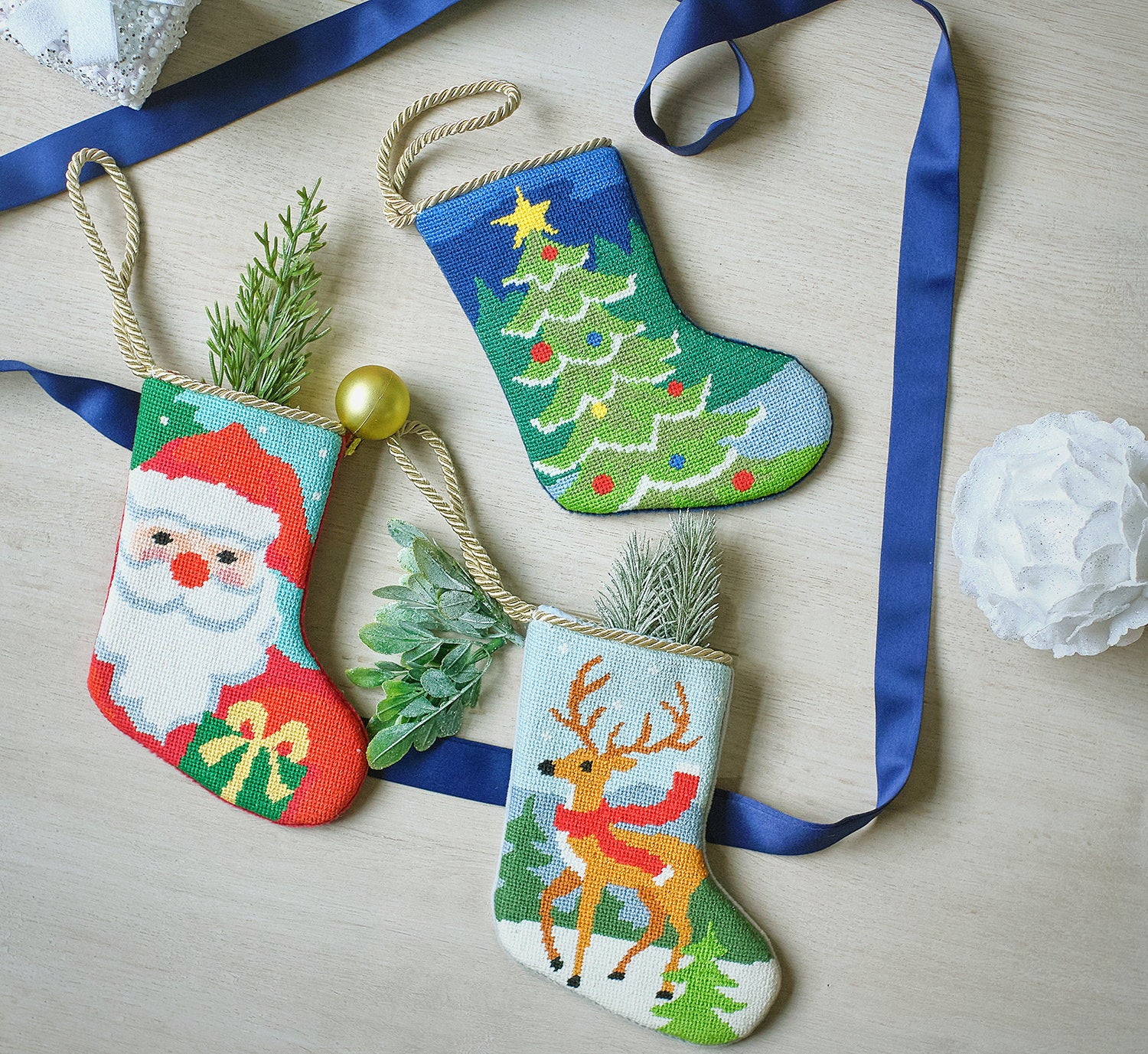 Reindeer Mini Embroidered Needlepoint Christmas Stocking, 6x4 inch, three mini stockings on blue ribbon with greenery