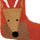 Closeup of Reindeer with Pom Pom Hooked Wool Christmas Stocking showing stitch texture and craftsmanship detail