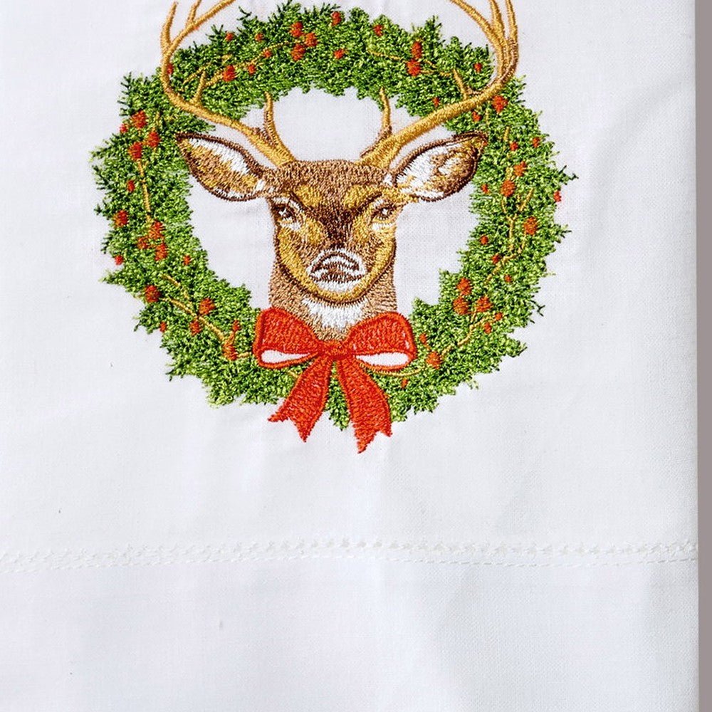 Closeup of Reindeer Wreath Embroidered Christmas Guest Towel, Set of 6 showing stitch texture and craftsmanship detail