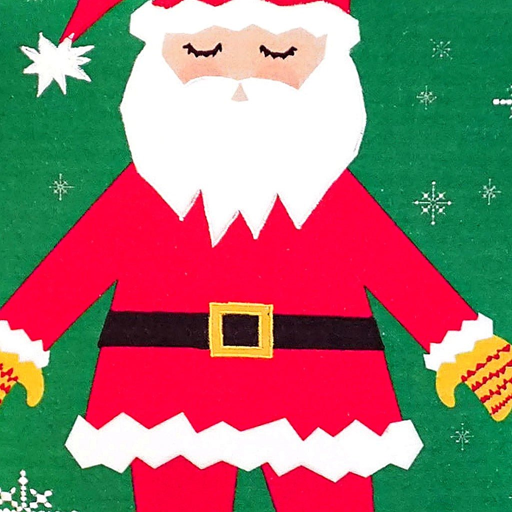 Retro Cartoon Santa Printed Holiday pillow fabric closeup showing hand-embroidered needlepoint wool texture and color detail