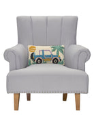 Retro Jeep Hooked Wool Throw Pillow on an armchair, showing the throw pillow at room scale, 9x16 inch