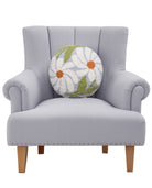 Retro Round Floral Hooked Wool Throw Pillow on an armchair, showing the throw pillow at room scale, 12x12 inch