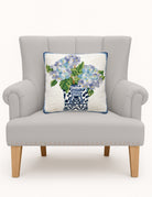Rhapsody in Blue I Hooked Wool Throw Pillow on an armchair, showing the throw pillow at room scale, 16x16 inch