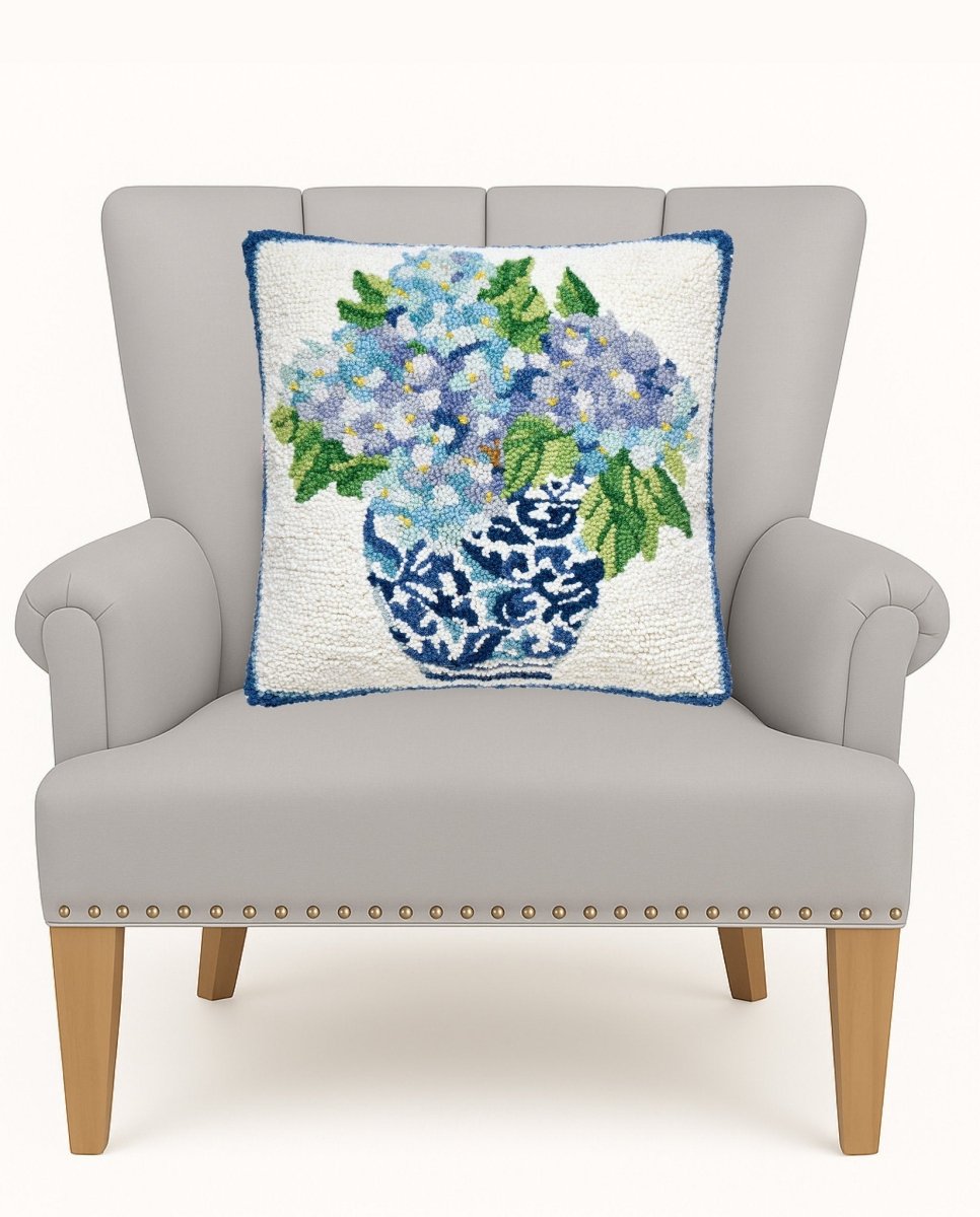 Rhapsody in Blue II Hooked Wool Throw Pillow on an armchair, showing the throw pillow at room scale, 16x16 inch