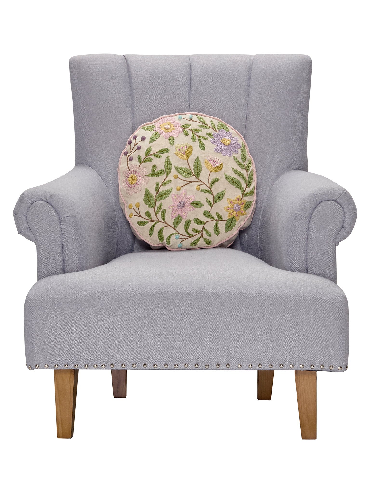 Round Floral Embroidered Throw Pillow on an armchair, showing the throw pillow at room scale, 16x16 inch