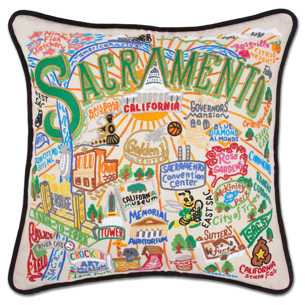 Sacramento, CA Gold Rush City embroidered throw pillow with gold rush imagery.