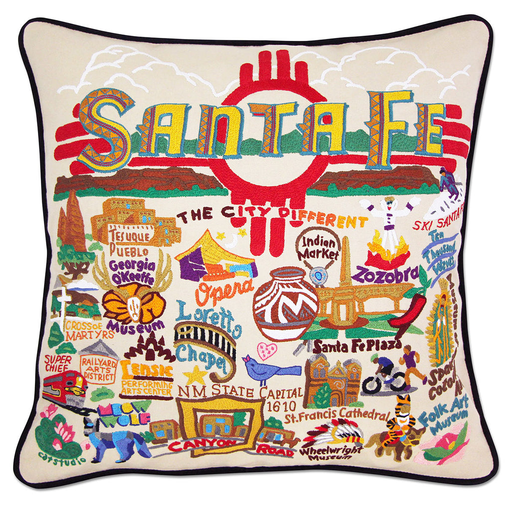 Santa Fe, NM Adobe City embroidered throw pillow with adobe architecture.