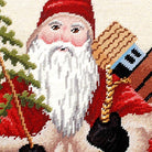 Hand-stitched wool detail of Santa Toys With Tree Wool Needlepoint Holiday needlepoint pillow showing intricate weave pattern and texture