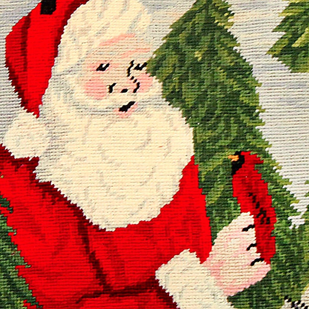 Closeup of Santa With Cardinal Wool Needlepoint Holiday needlepoint throw pillow highlighting hand-stitched wool craftsmanship and fabric detail