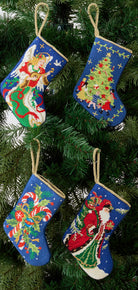 Santa with Gift Mini Embroidered Needlepoint Christmas Stocking shown alongside other designs in the same collection, 6x4 inch