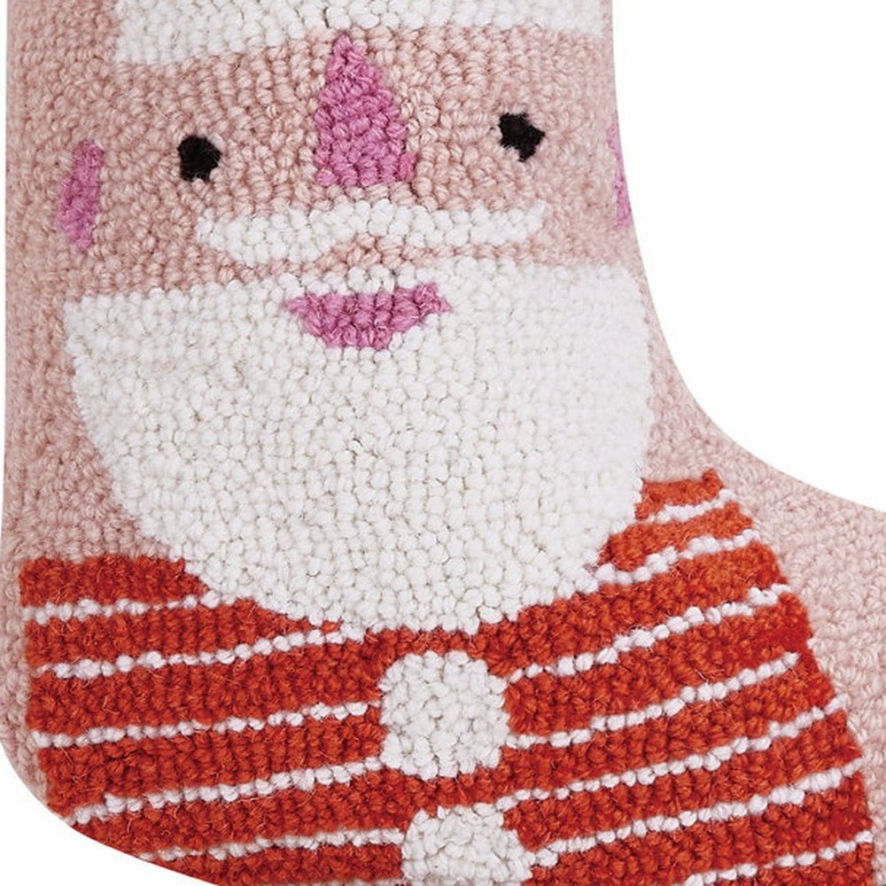 Closeup of Santa with Pom Pom Tassel Hooked Wool Christmas Stocking showing stitch texture and craftsmanship detail