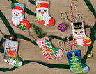 Santa with Present Mini Embroidered Needlepoint Christmas Stocking, 6x4 inch, six mini stockings with green ribbon and candy canes