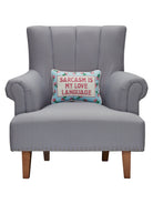 Sarcasm's My Love Embroidered Needlepoint Throw Pillow on an armchair, showing the throw pillow at room scale, 10x14 inch