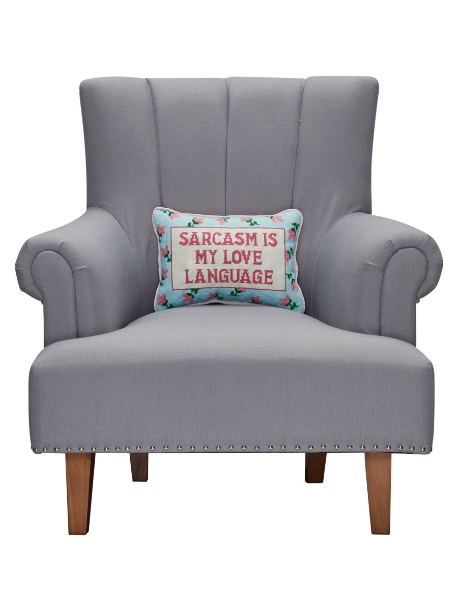 Sarcasm's My Love Embroidered Needlepoint Throw Pillow on an armchair, showing the throw pillow at room scale, 10x14 inch