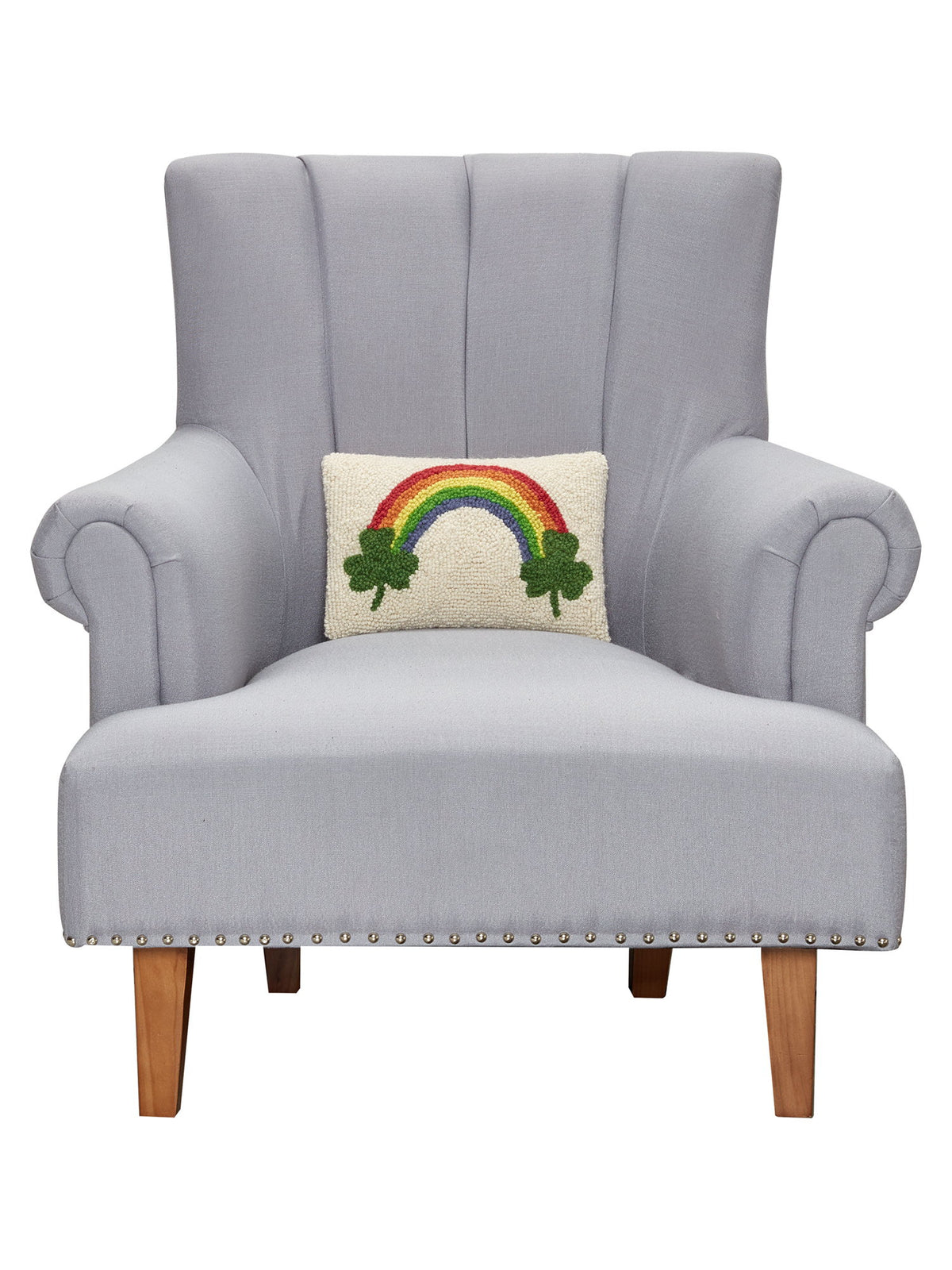 Shamrock Rainbow Hooked Wool St. Patrick's Day Throw Pillow on an armchair, showing the throw pillow at room scale, 8x12 inch