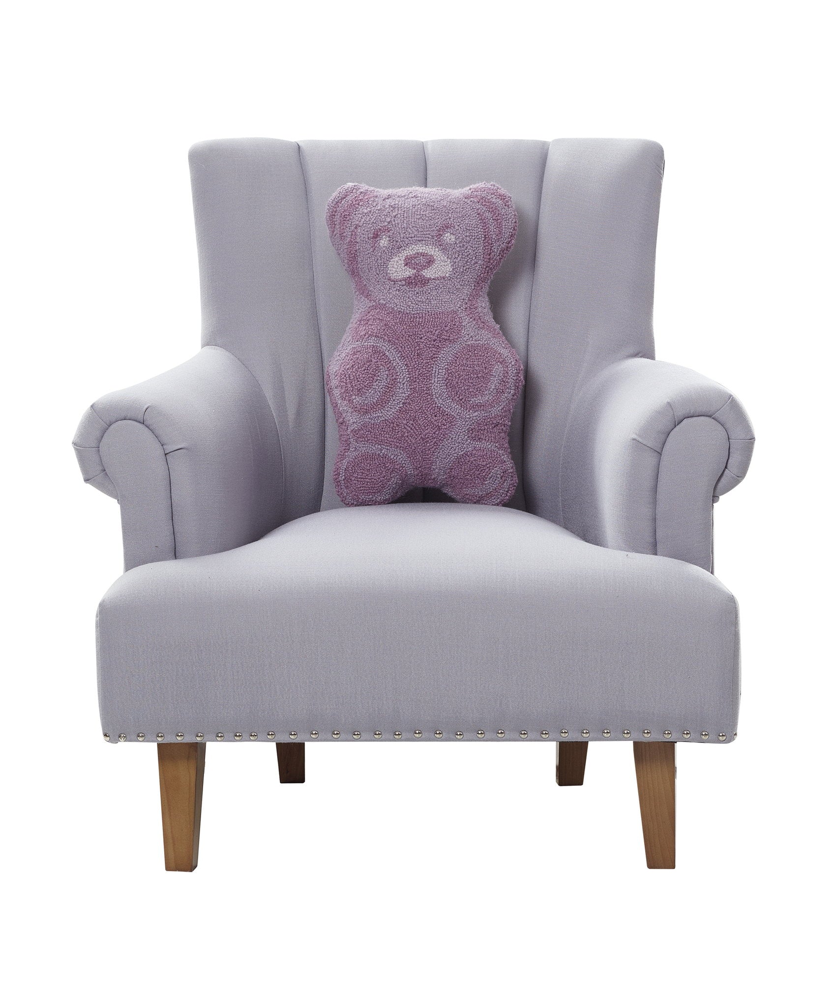 Shaped Gummy Bear Hooked Wool Throw Pillow on an armchair, showing the throw pillow at room scale, 12x18 inch