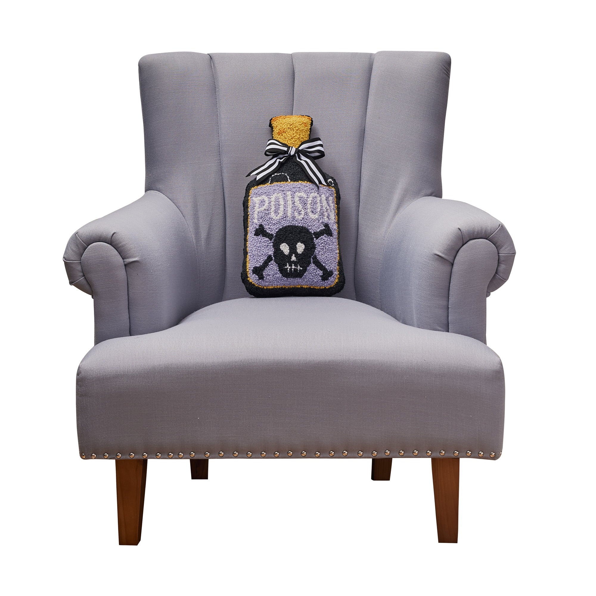 Shaped Poison Bottle Hooked Wool Halloween Throw Pillow on an armchair, showing the throw pillow at room scale, 9x16 inch