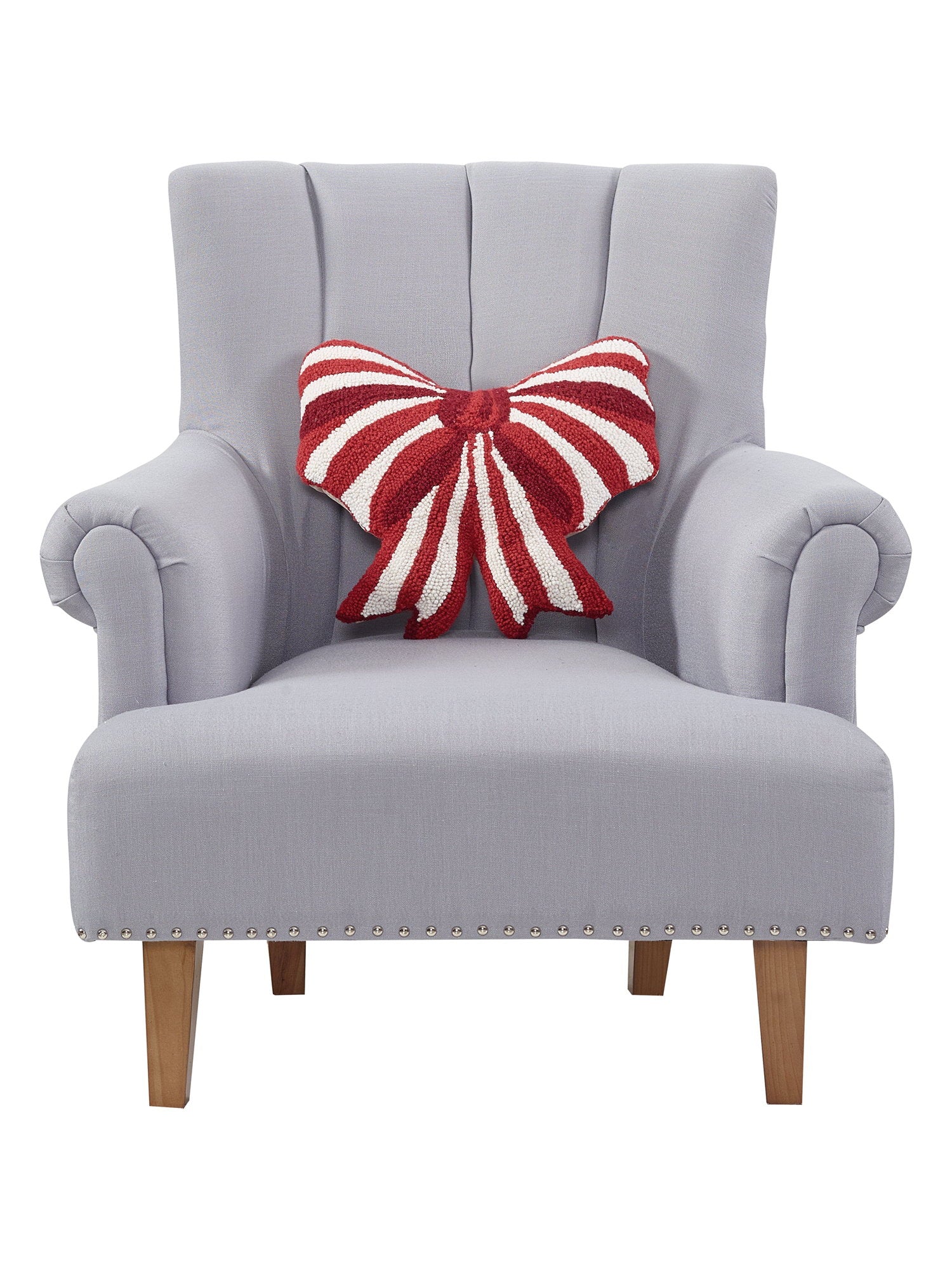 Shaped Red & White Bow Hooked Wool Christmas Throw Pillow on an armchair, showing the throw pillow at room scale, 16x16 inch