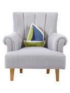 Shaped Sailboat Hooked Wool Throw Pillow on an armchair, showing the throw pillow at room scale, 14x14 inch