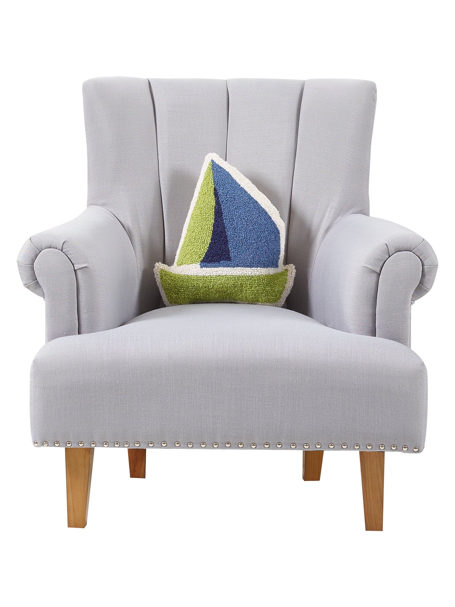 Shaped Sailboat Hooked Wool Throw Pillow on an armchair, showing the throw pillow at room scale, 14x14 inch