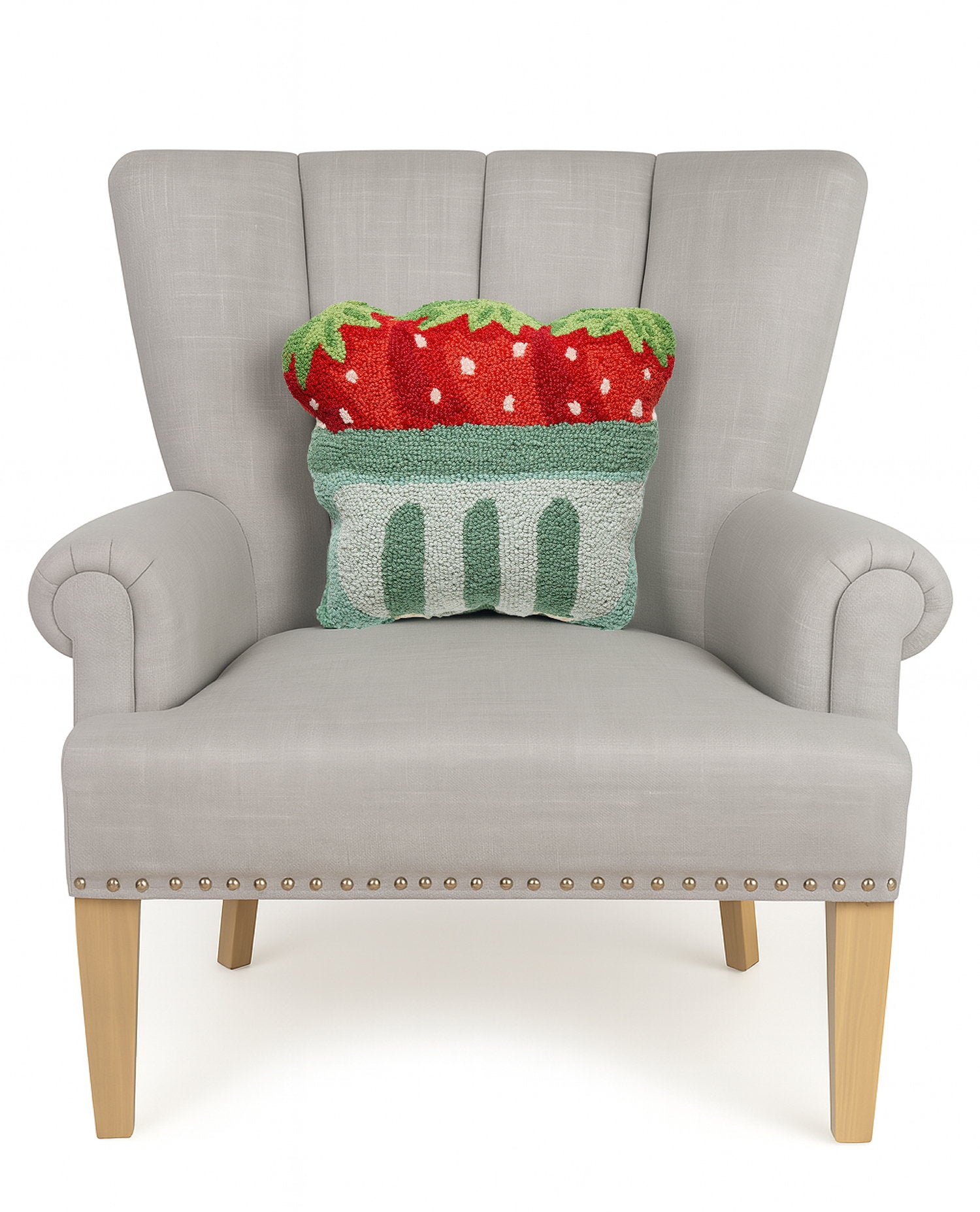 Shaped Strawberry Pint Hooked Wool Throw Pillow on an armchair, showing the throw pillow at room scale, 14x16 inch