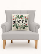 Simple Merry Foliage Hooked Wool Christmas Throw Pillow on an armchair, showing the throw pillow at room scale, 16x16 inch