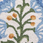 Single Blue Bloom Mughal Flower Hooked Wool Throw Pillow, close-up detail