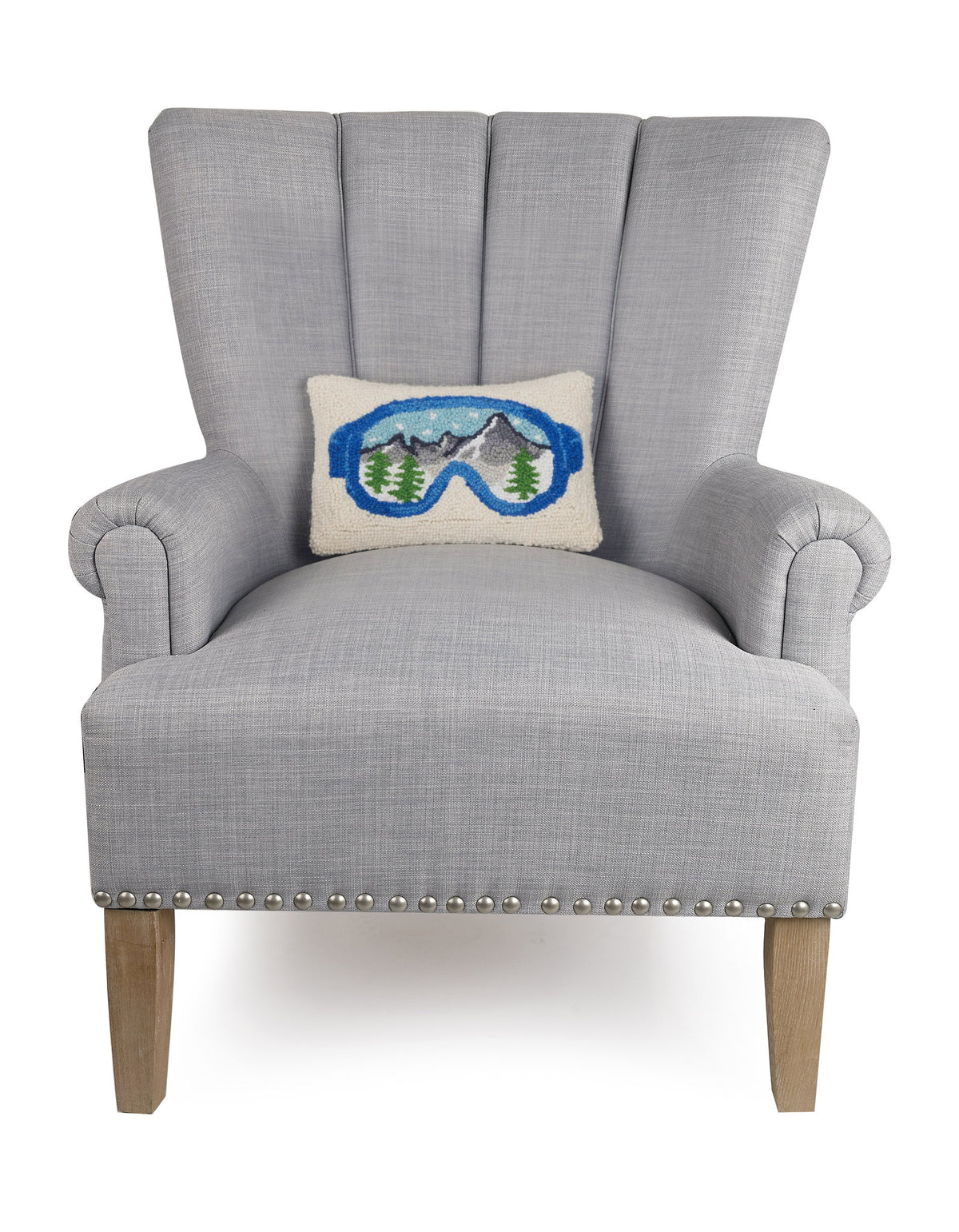 Ski Goggles Hooked Wool Christmas Throw Pillow on an armchair, showing the throw pillow at room scale, 8x12 inch