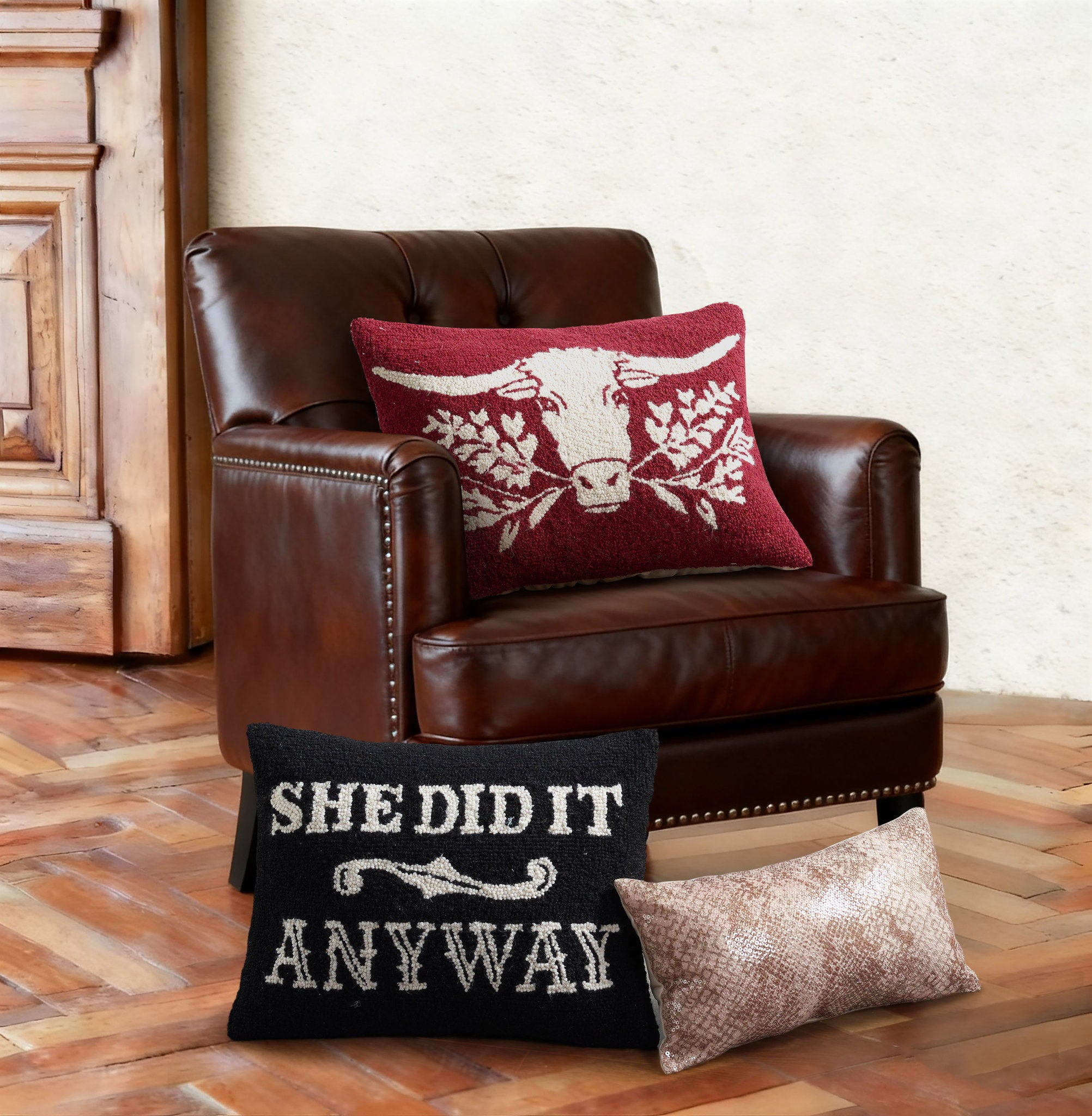 Snake Sequin Printed Throw Pillow, 9x16 inch, three pillows on and beside a leather armchair