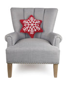Snowflake Shaped Hooked Wool Christmas Throw Pillow on an armchair, showing the throw pillow at room scale, 14x16 inch