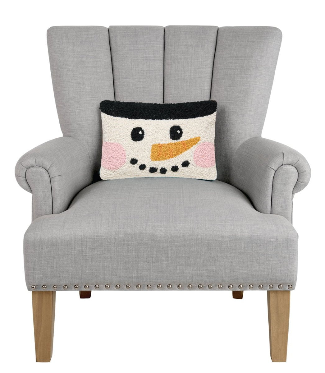 Snowman Face Hooked Wool Christmas Throw Pillow on an armchair, showing the throw pillow at room scale, 8x12 inch