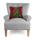 Snowy Evergreen Christmas Tree Hooked Wool Throw Pillow on an armchair, showing the throw pillow at room scale, 16x16 inch